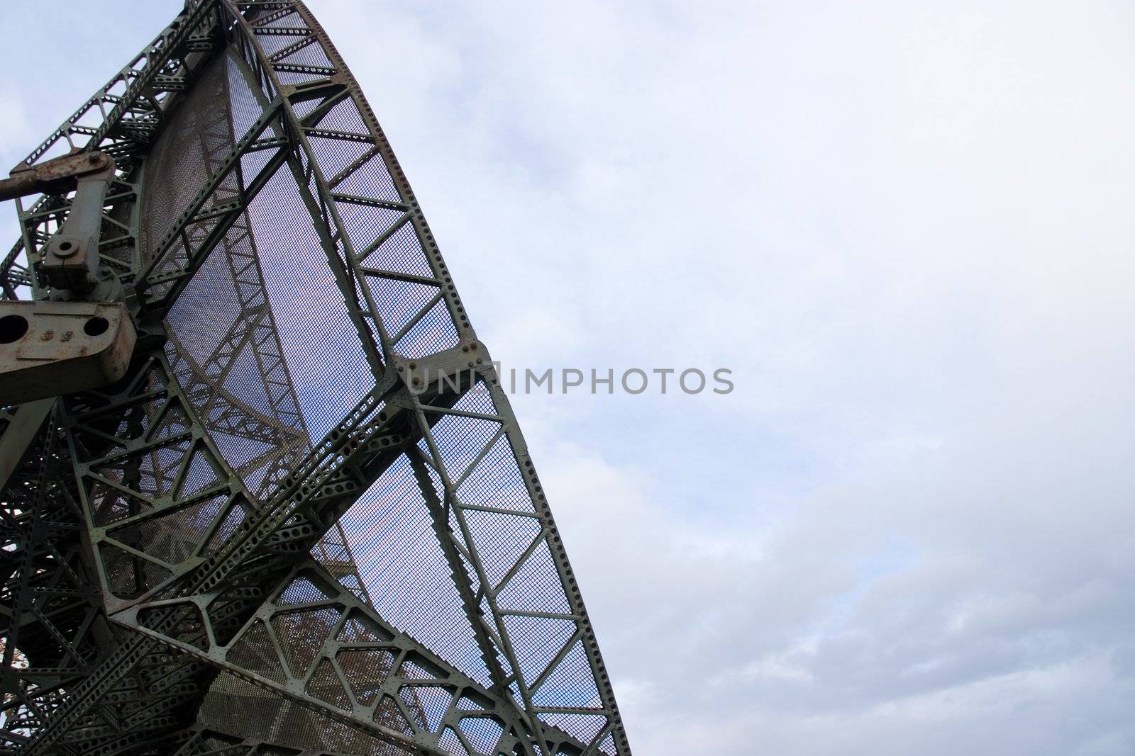 Portable military radar set against a white sky