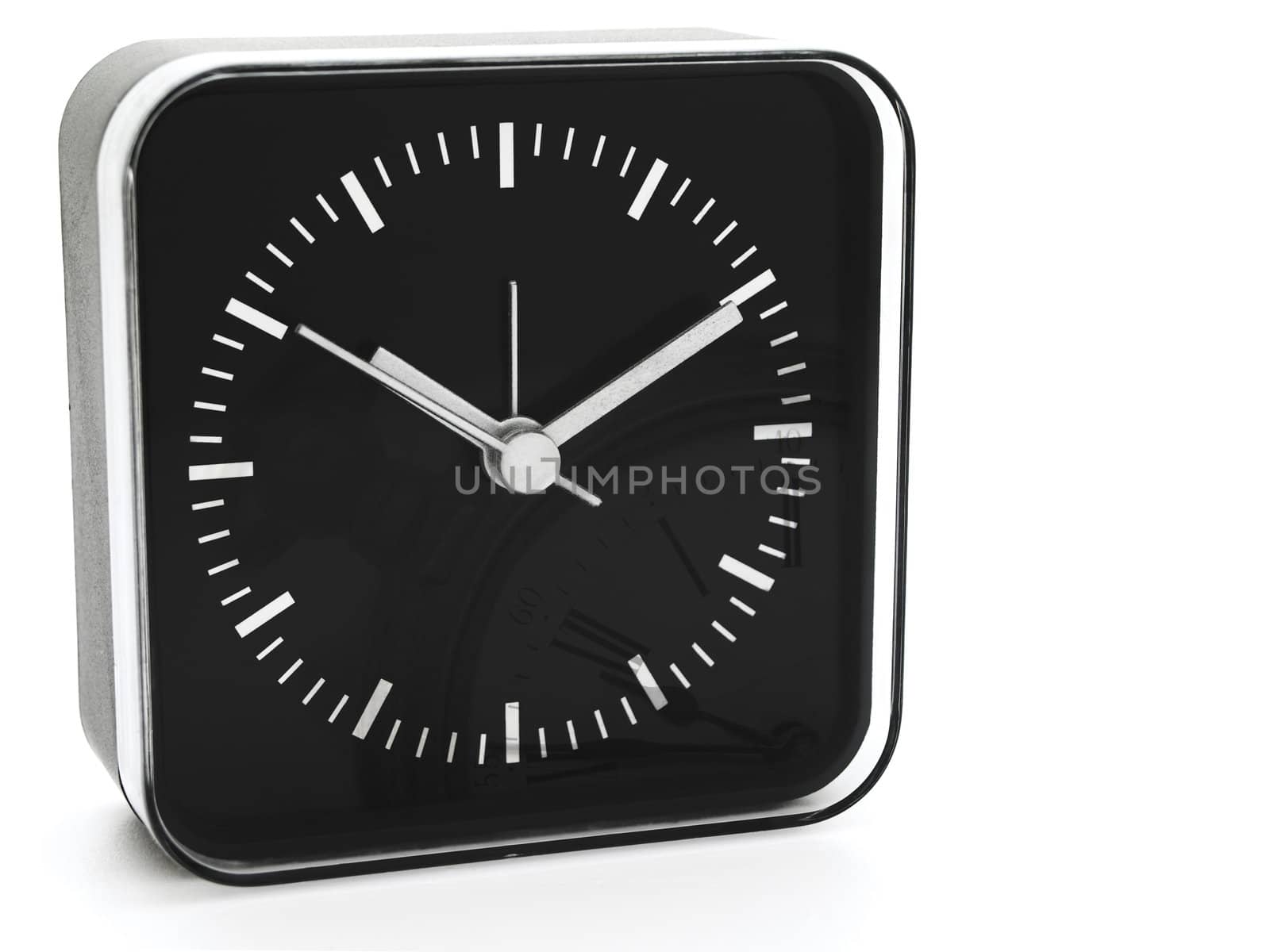 modern black clock with old watch reflection against white