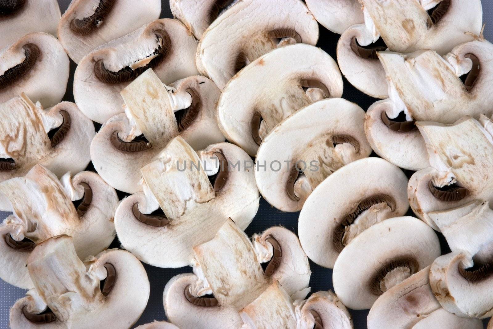 A background of chopped buttton mushrooms