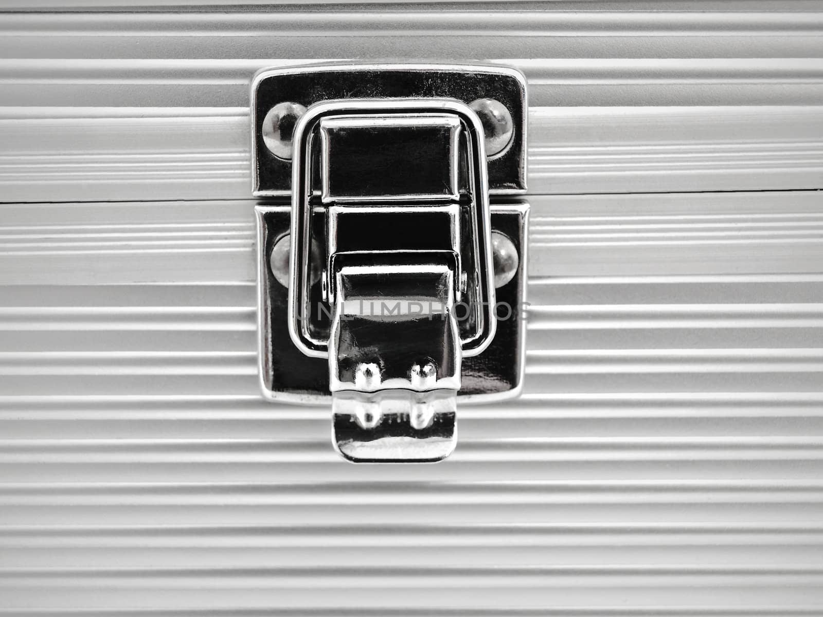 close up view on aluminum box lock 
