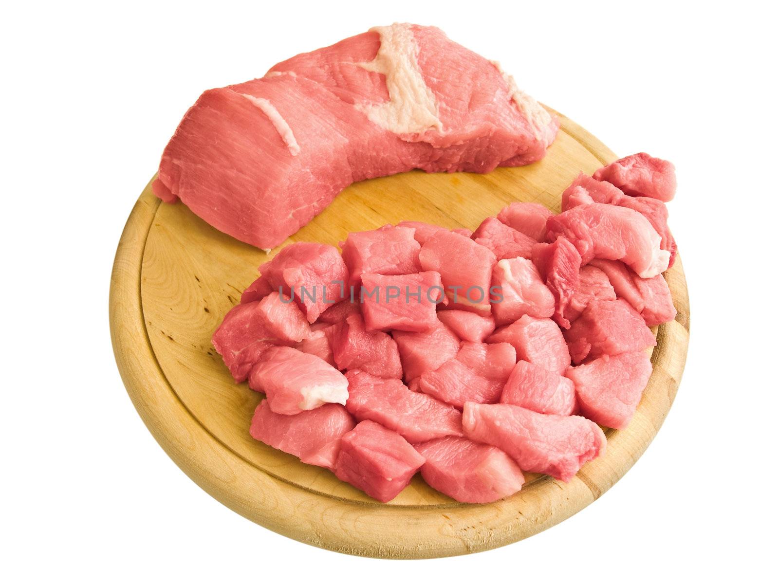 pieces of meat on hardboard over white