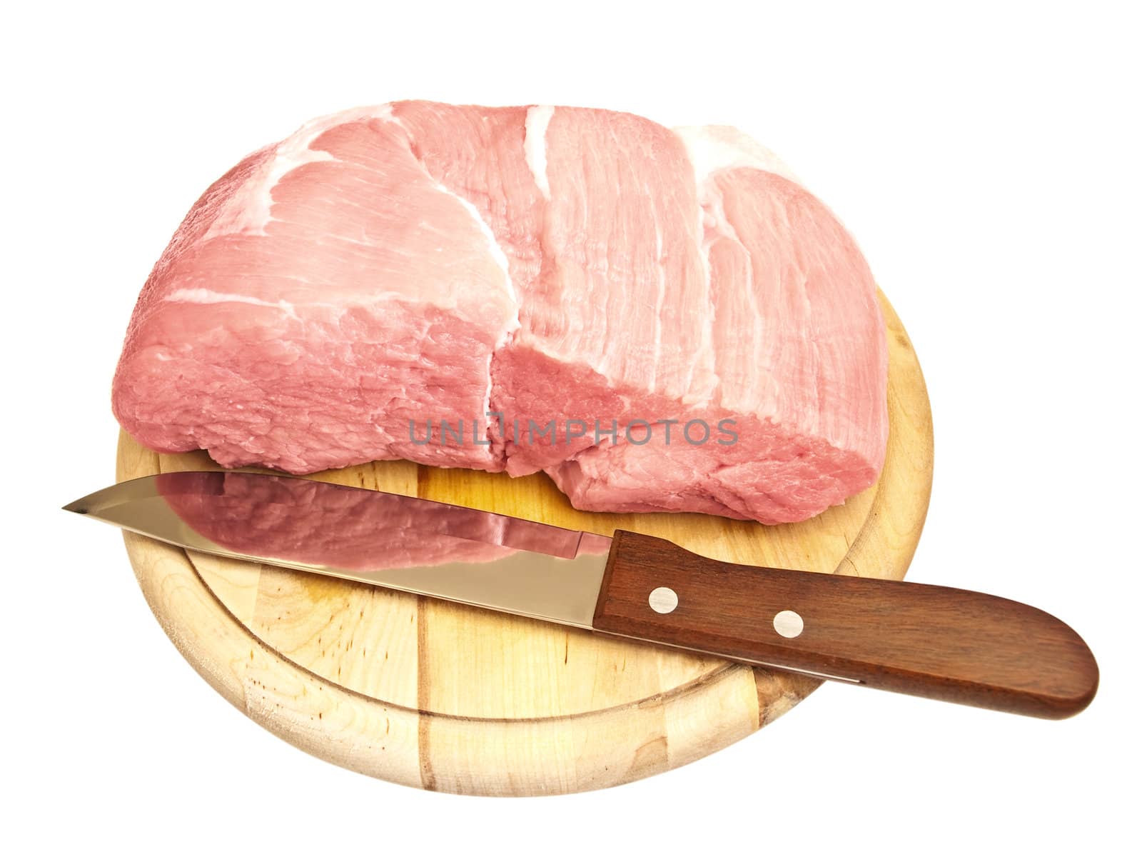 piece of meat and kitchen knife on the board