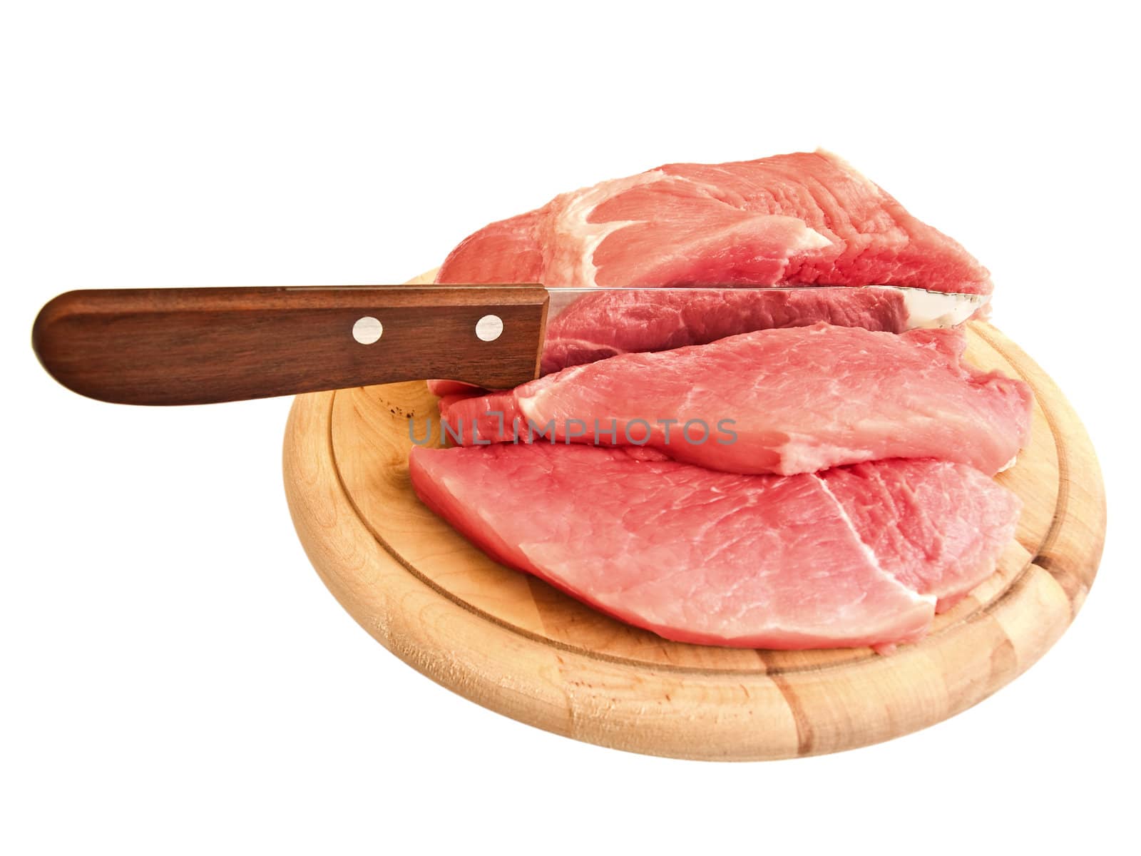 piecies of meat with knife on the hardboard over white