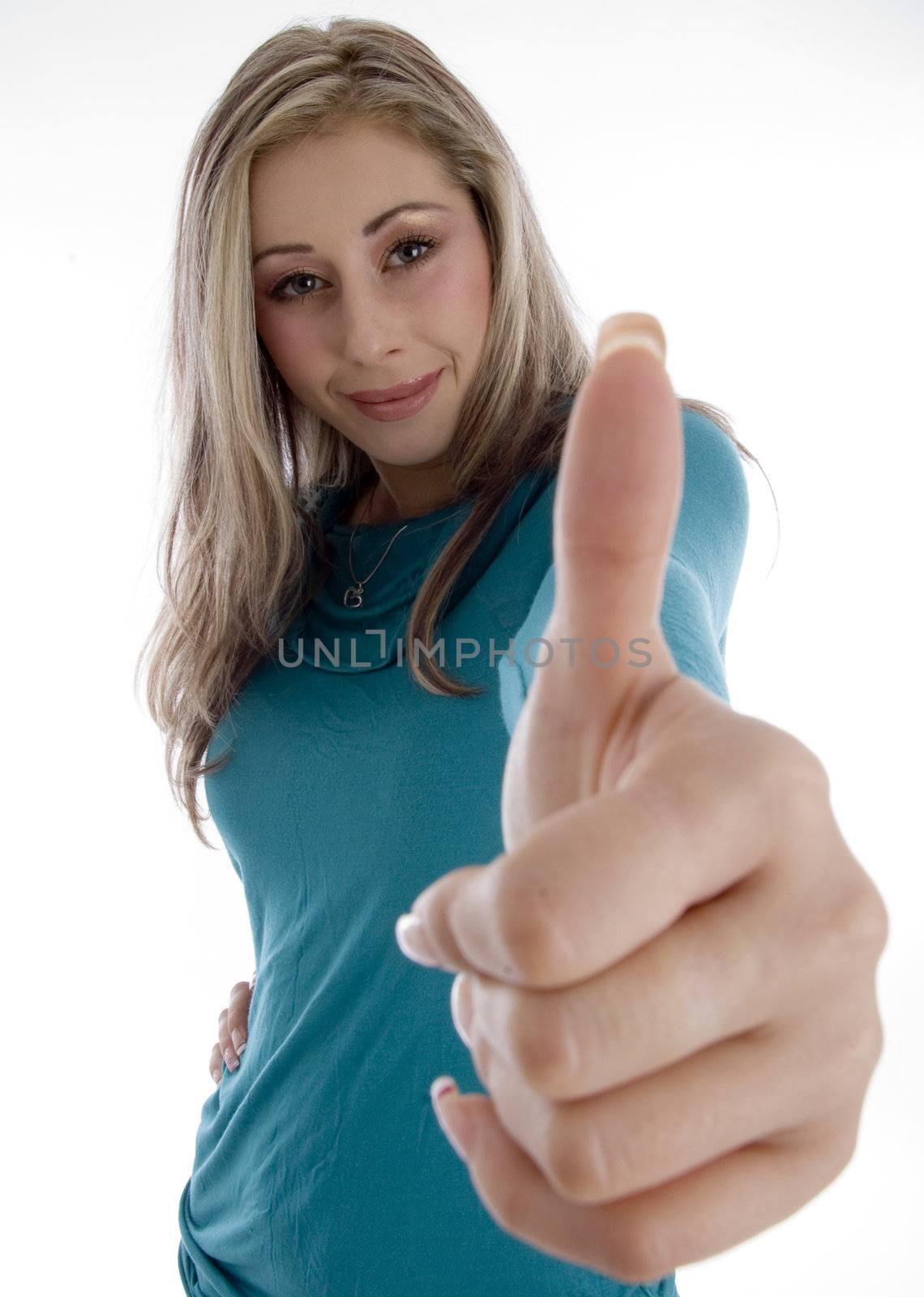 smiling woman showing approval sign on an isolated white background