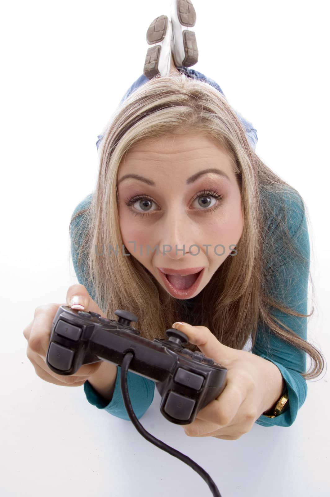 surprised woman holding remote control against white background