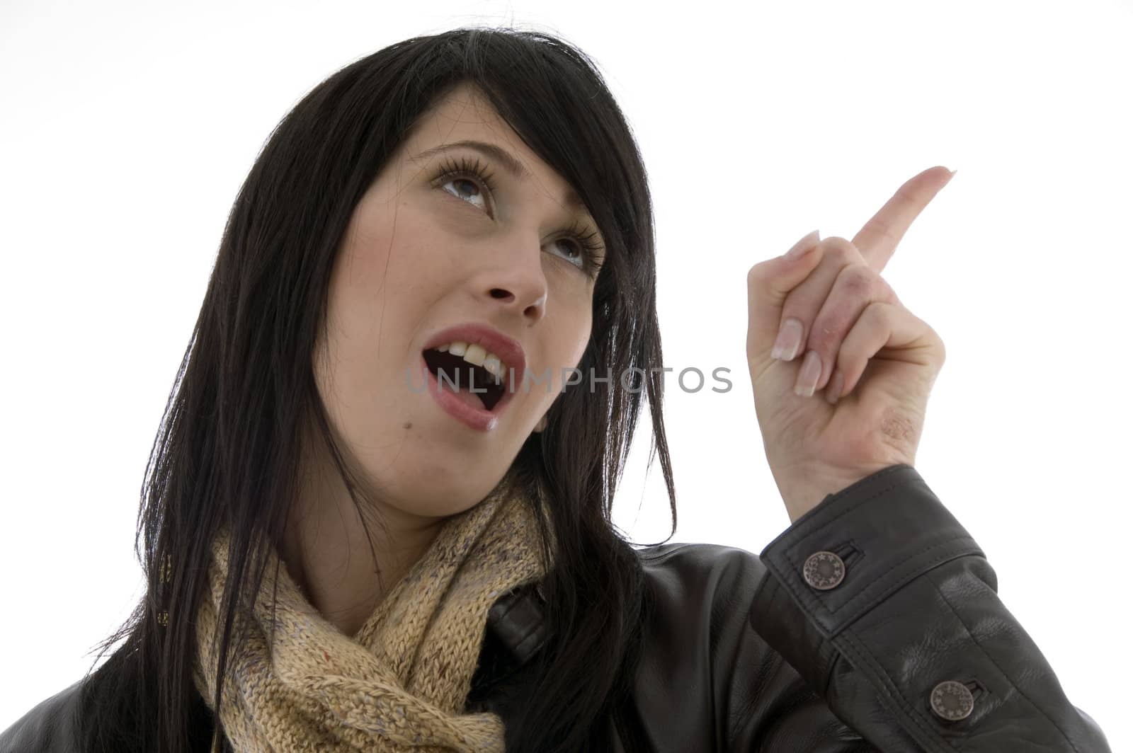 female with pointing finger against white background