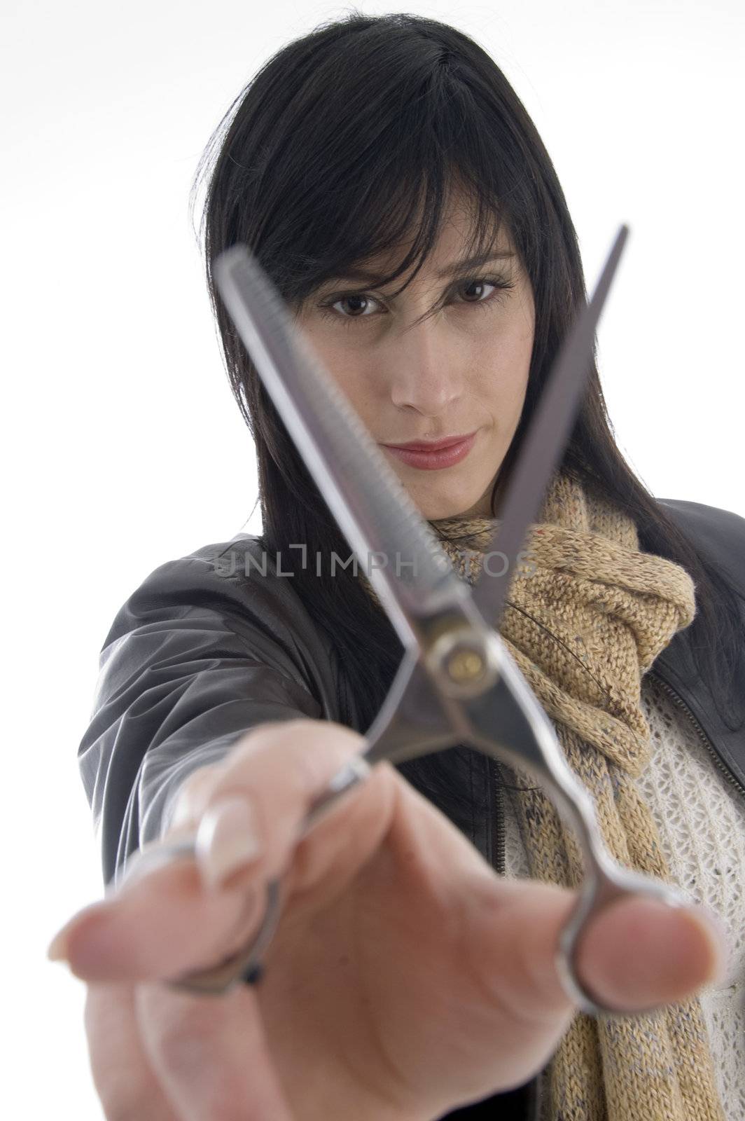 female barber holding scissors on an isolated white background