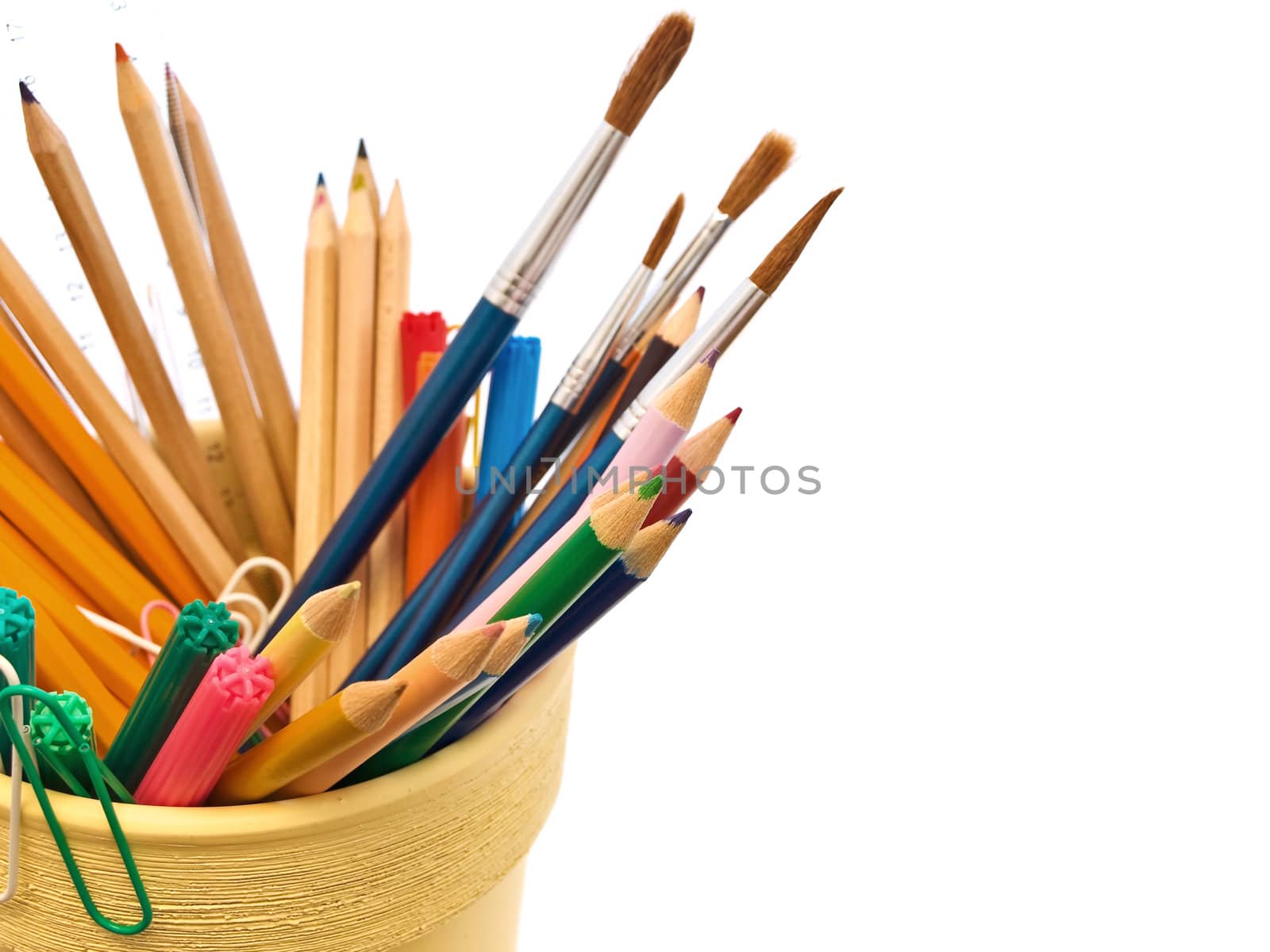 different office supplies over the white background