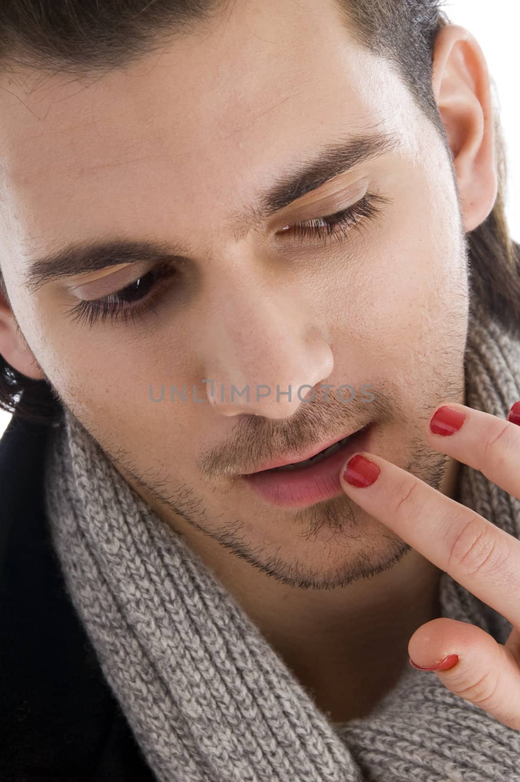 lips of man being touched by female hands with white background