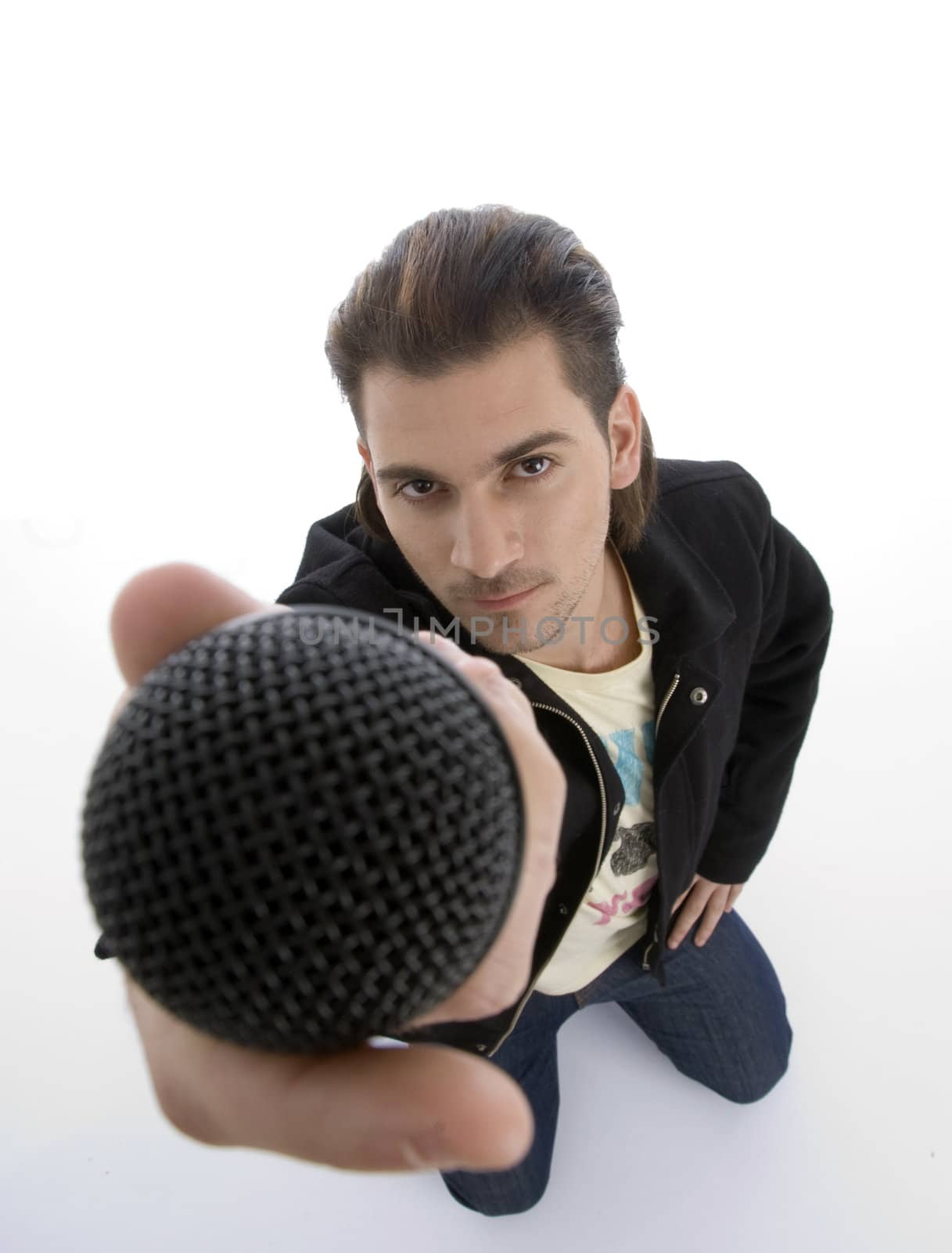 high angle view of singer holding microphone isolated on white background