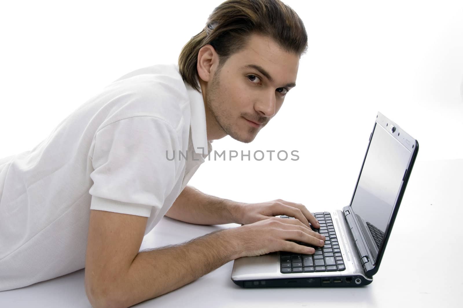 young man with laptop on an isolated white backgound