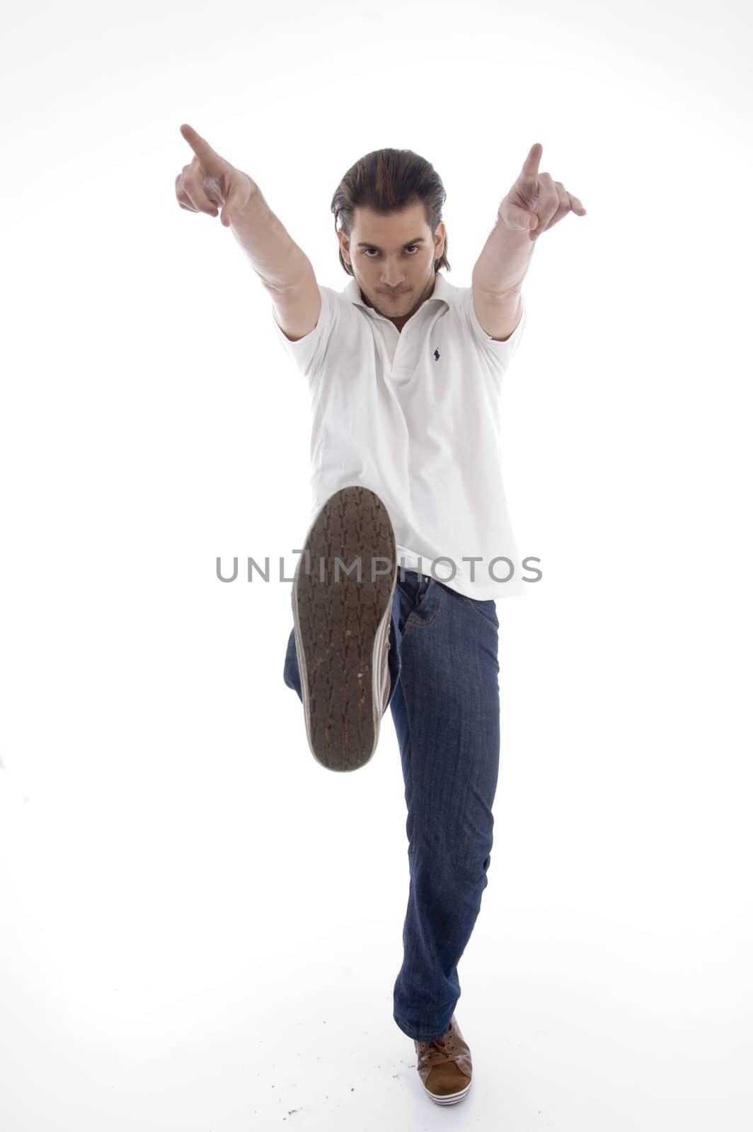 handsome young man having fun on an isolated white backgound