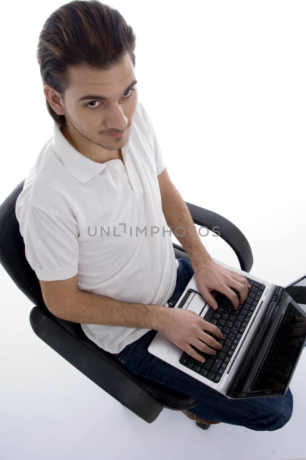 young man working on laptop on an isolated white backgound