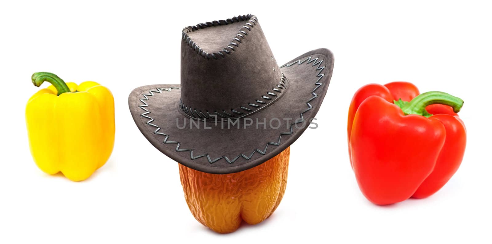 cool pepper in cowboy hat surrounded by vegetables