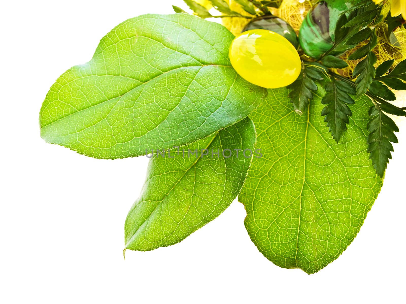 green leaves bouquet with glass stone against white background
