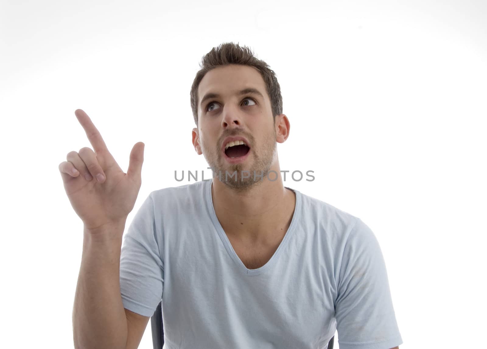 young man pointing up on an isolated white backgound