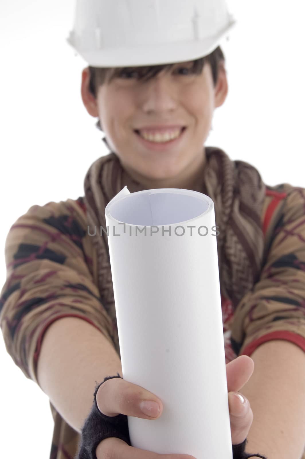 smiling young architect showing paper roll on an isolated background