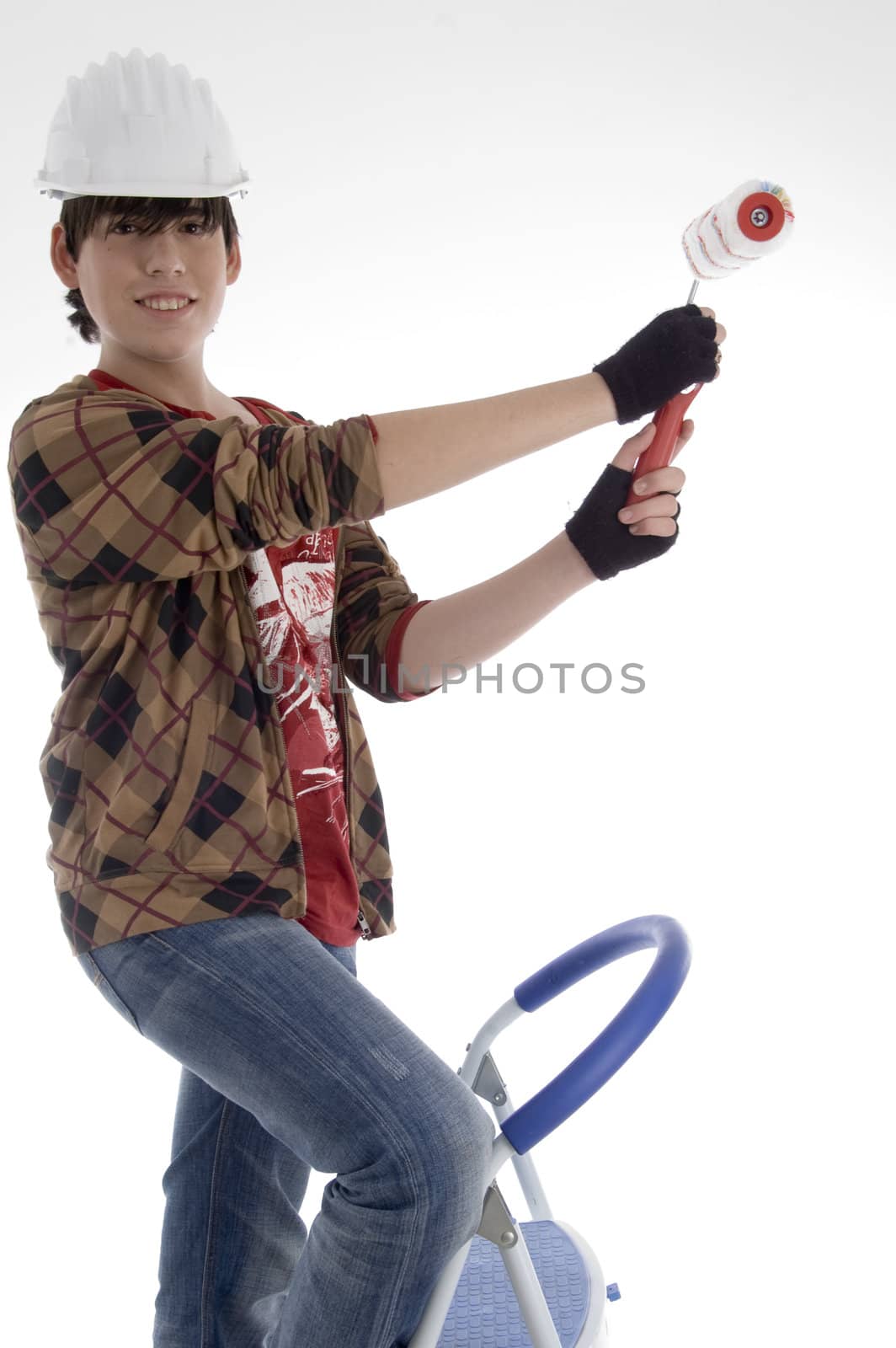 young architect with paint brush against white background