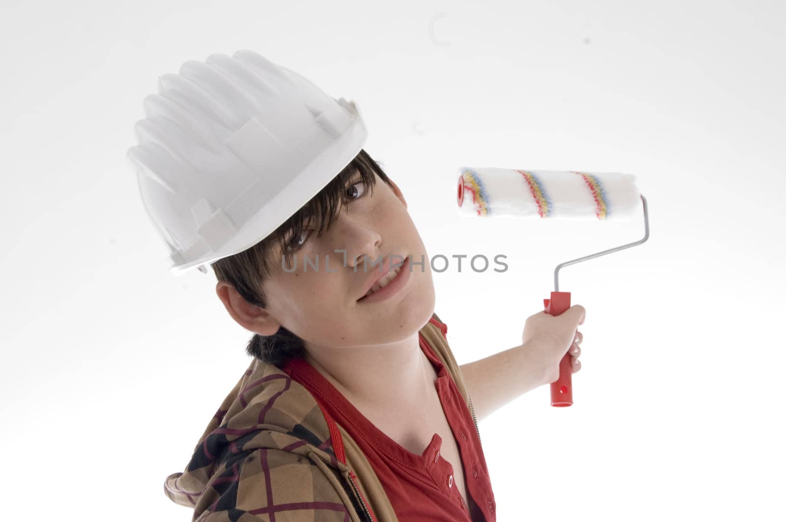 smiling young architect posing with paint brush on an isolated white background