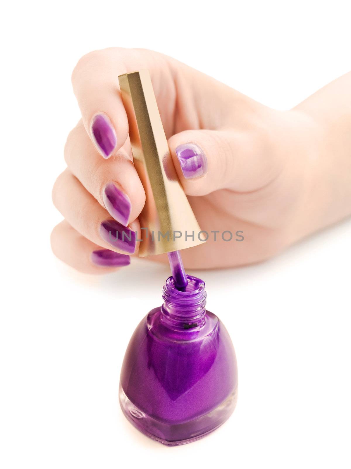 manicure: nail polish and woman hand over white background