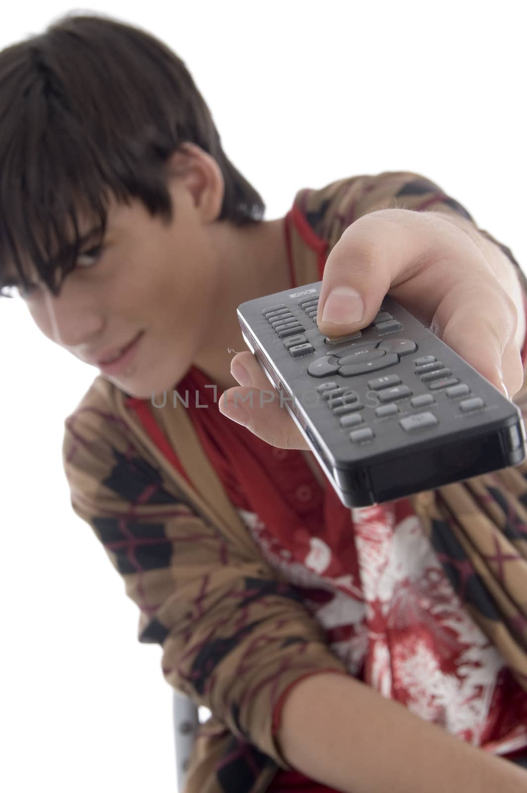 boy posing with remote against white background