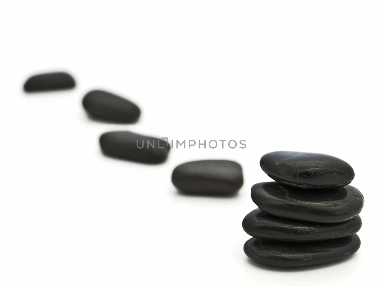 Relax theme with Zen stones over white background