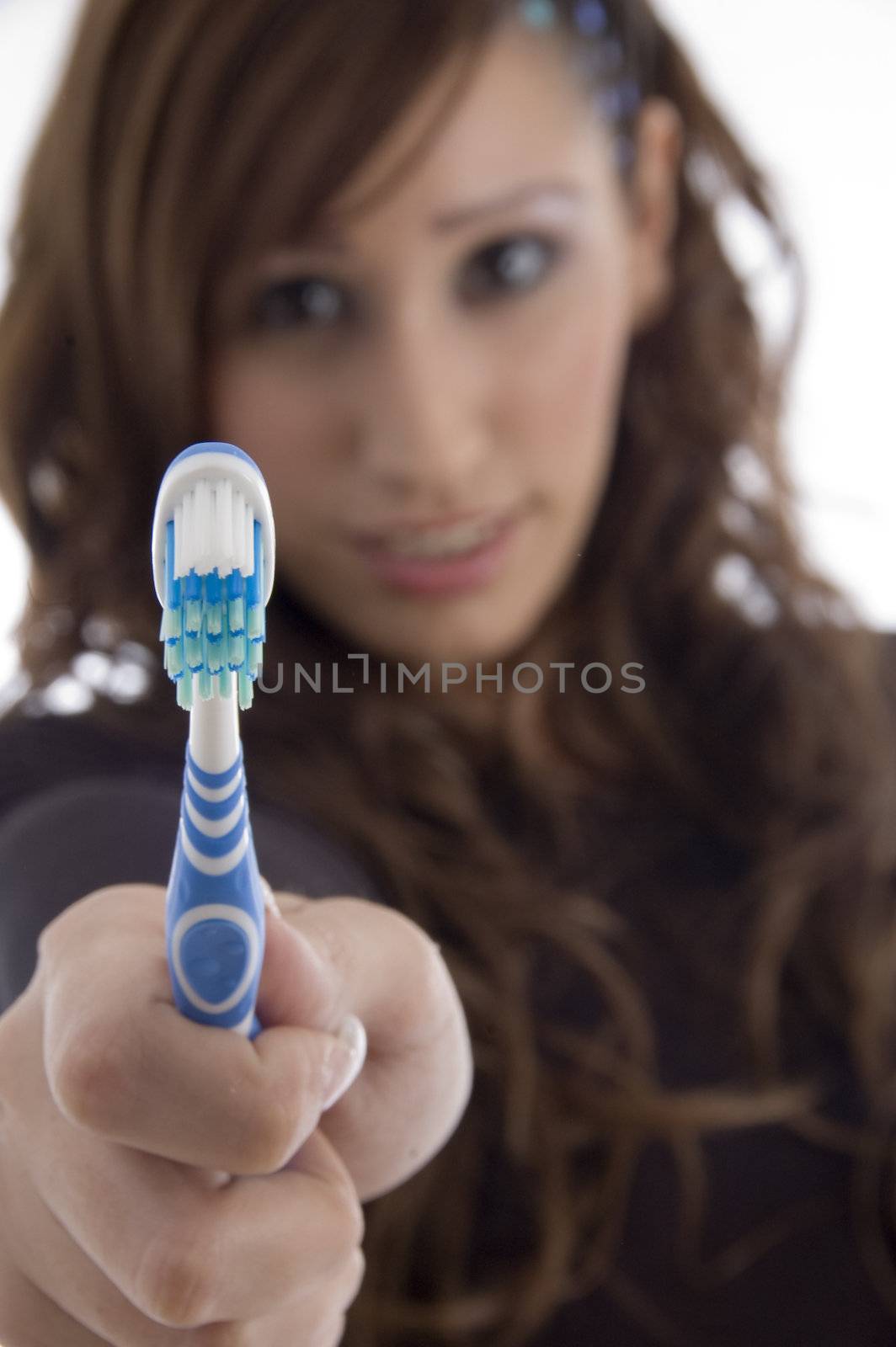 beautiful woman with tooth brush on an isolated white background