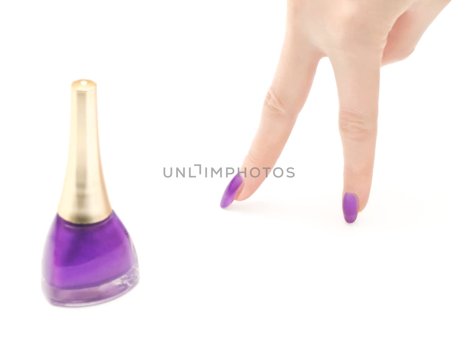 nailpolish and womans hand with lilac manicure over white