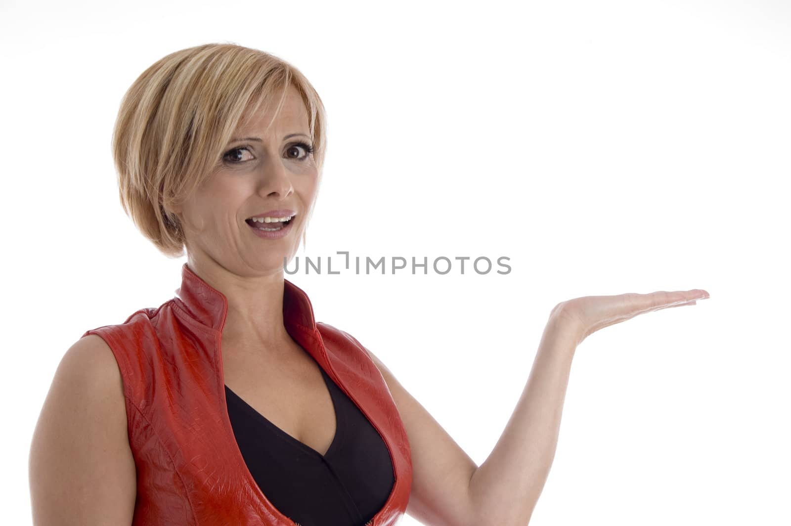 smiling woman showing palm on an isolated background