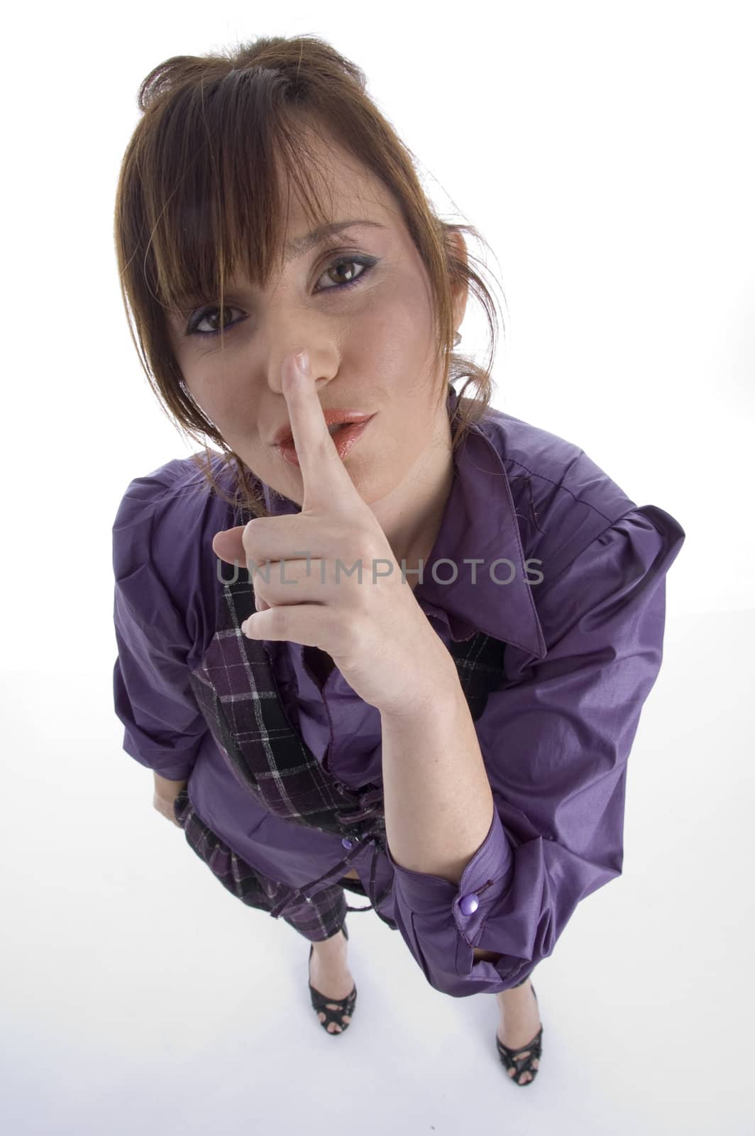 woman instructing you to keep silent against white background