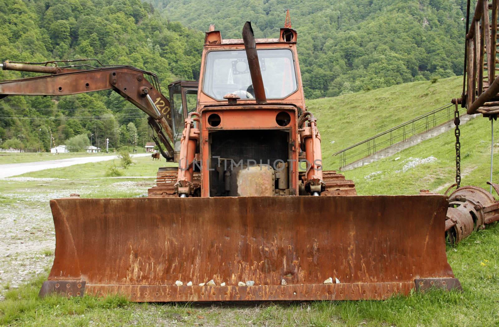 An old tractor abandoned in a valley