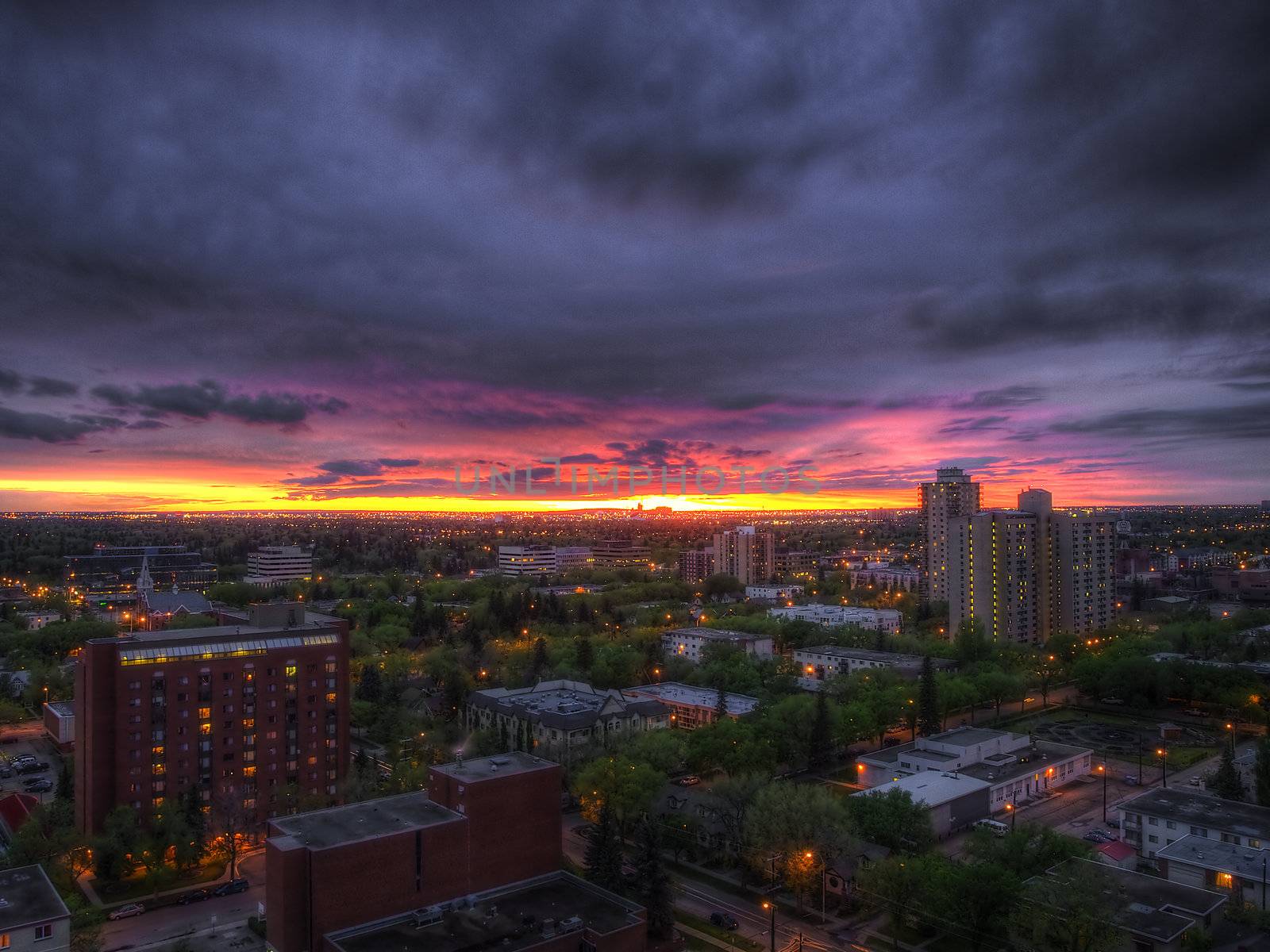 This photo of Edmonton was created from 4 different exposures with Photomatix. The brilliant yellow and magenta shine through as the storm clouds move over the city.