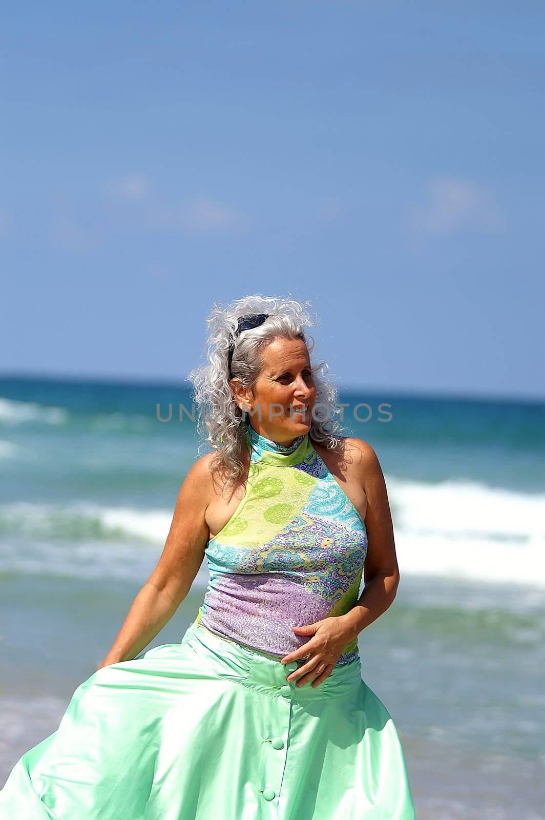 an elder woman at the beach