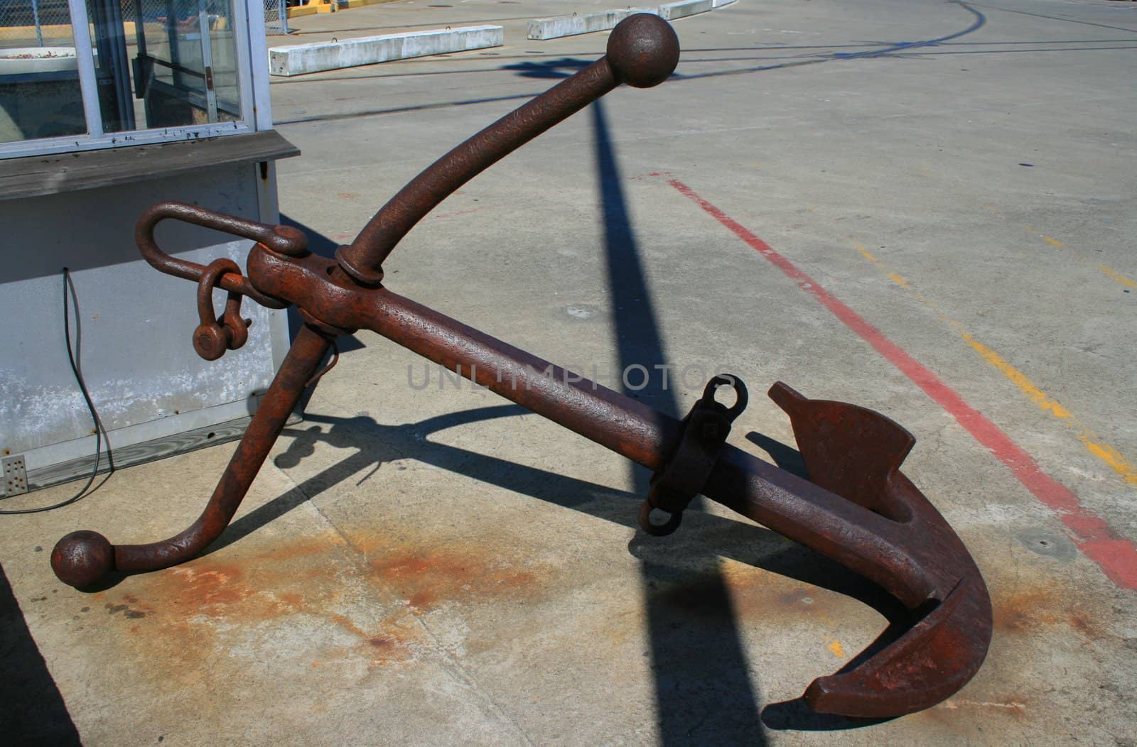 Close up of an old and rusty anchor.
