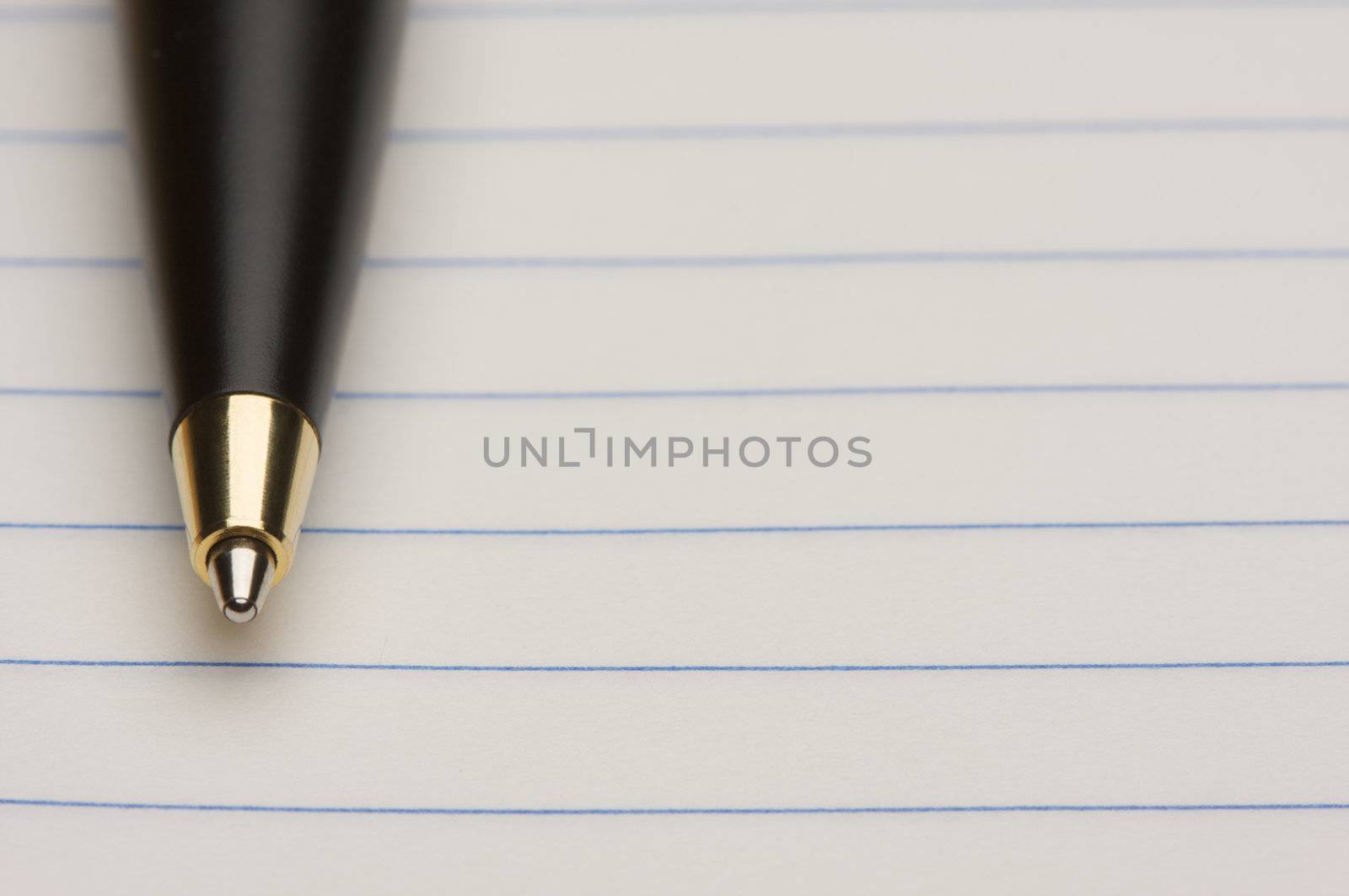 Pen and Pad of Lined Paper