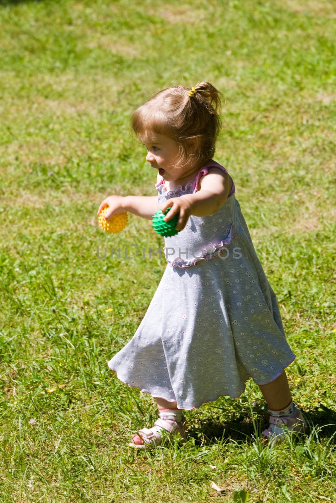 children series: little girl are play the ball game