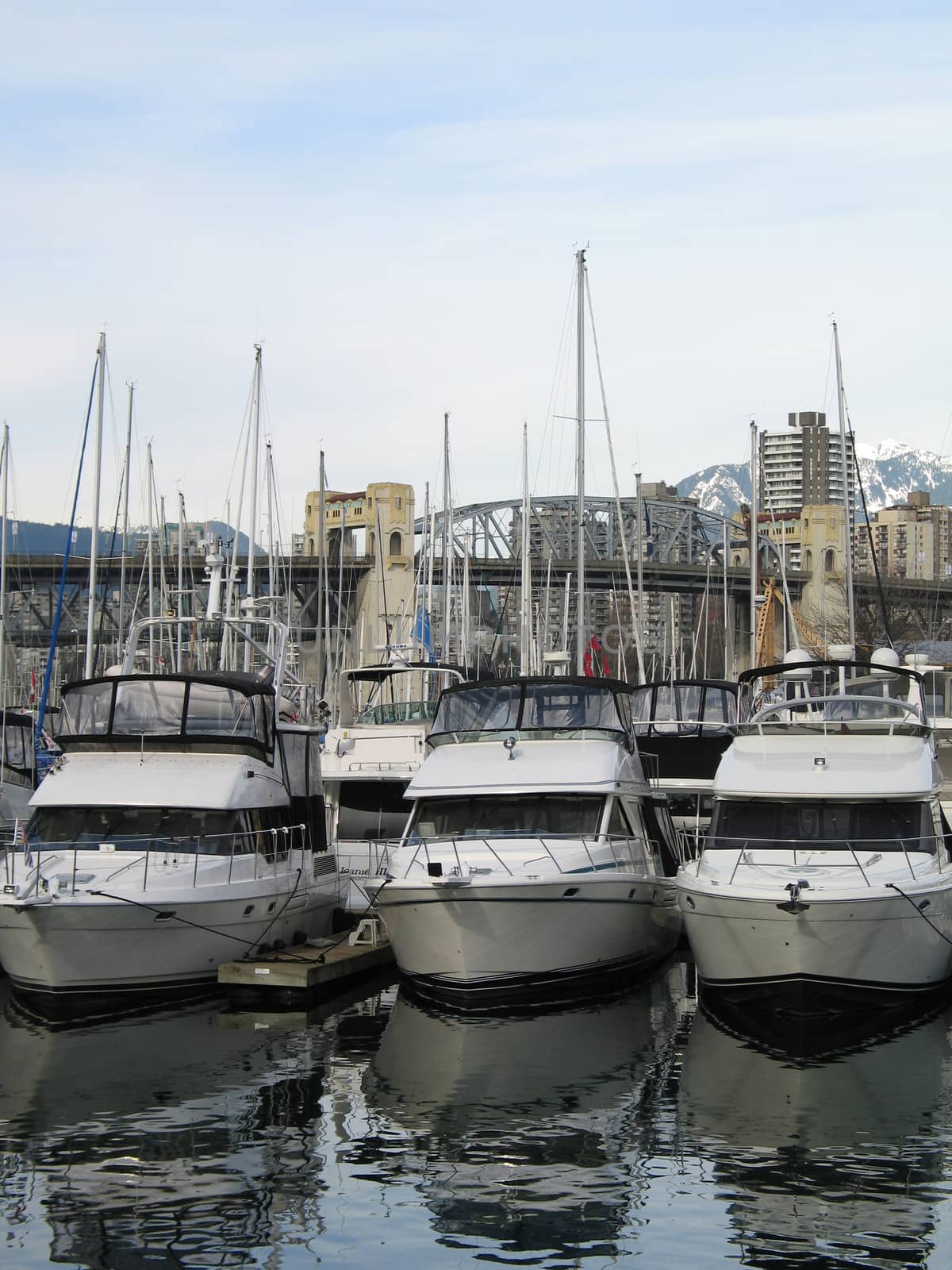 boats parked at a marina by mmm