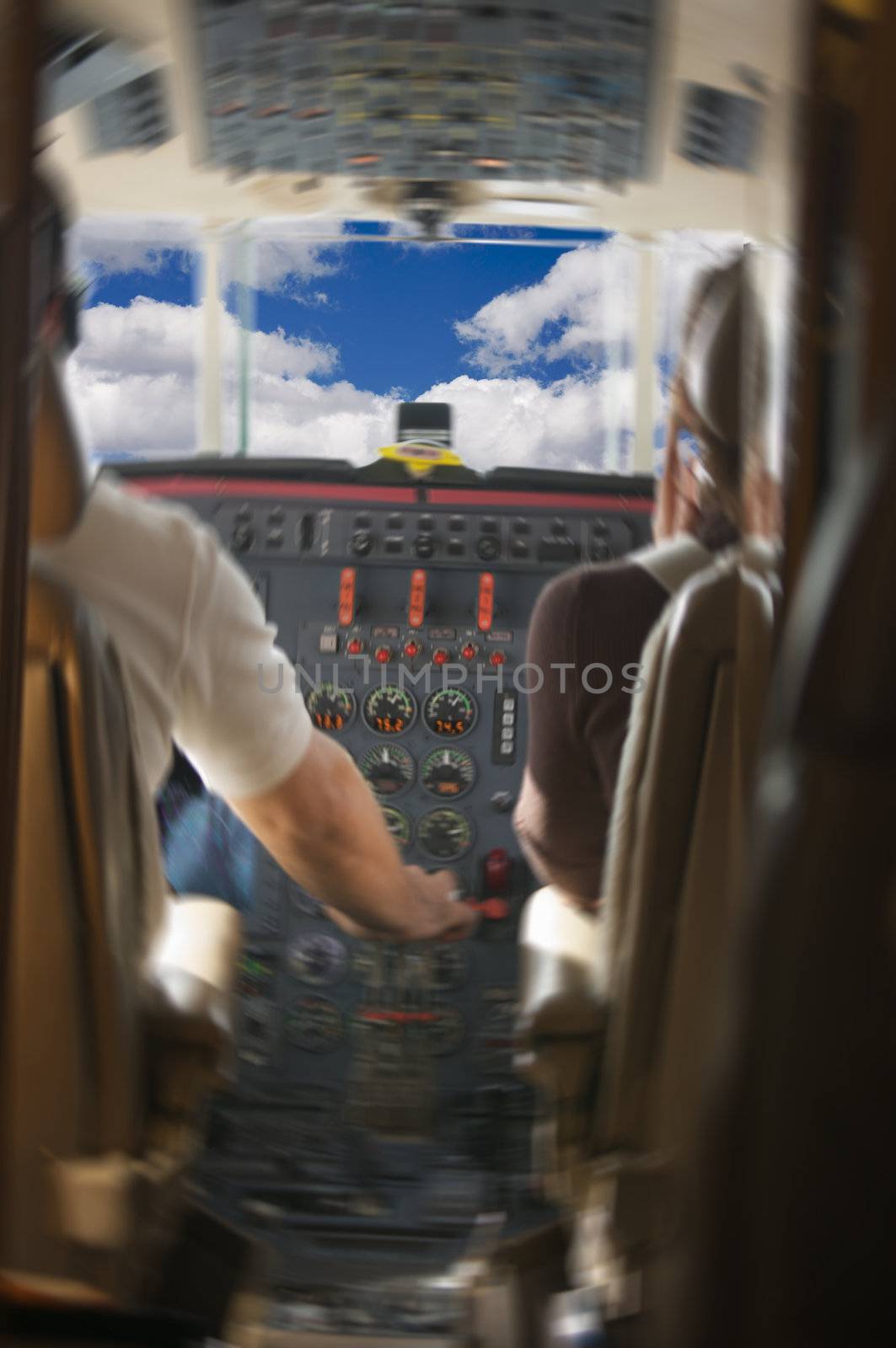 Jet Cockpit with Pilots and Clouds - motion added.