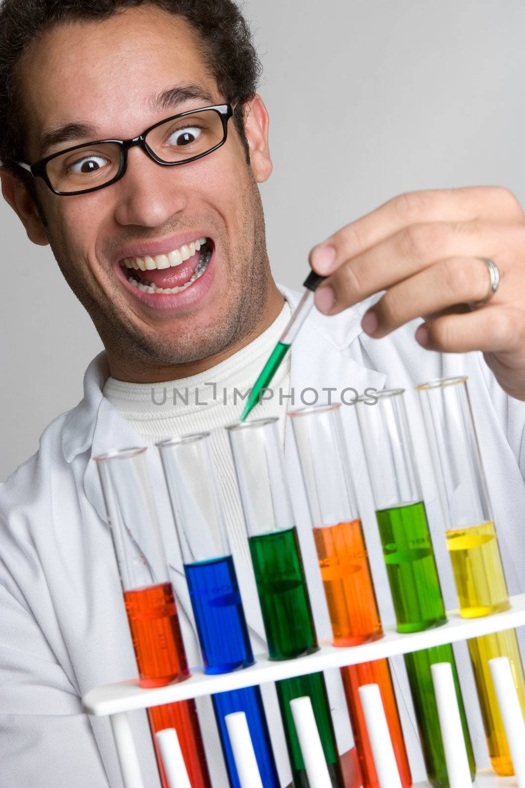 Man doing test tube science experiment