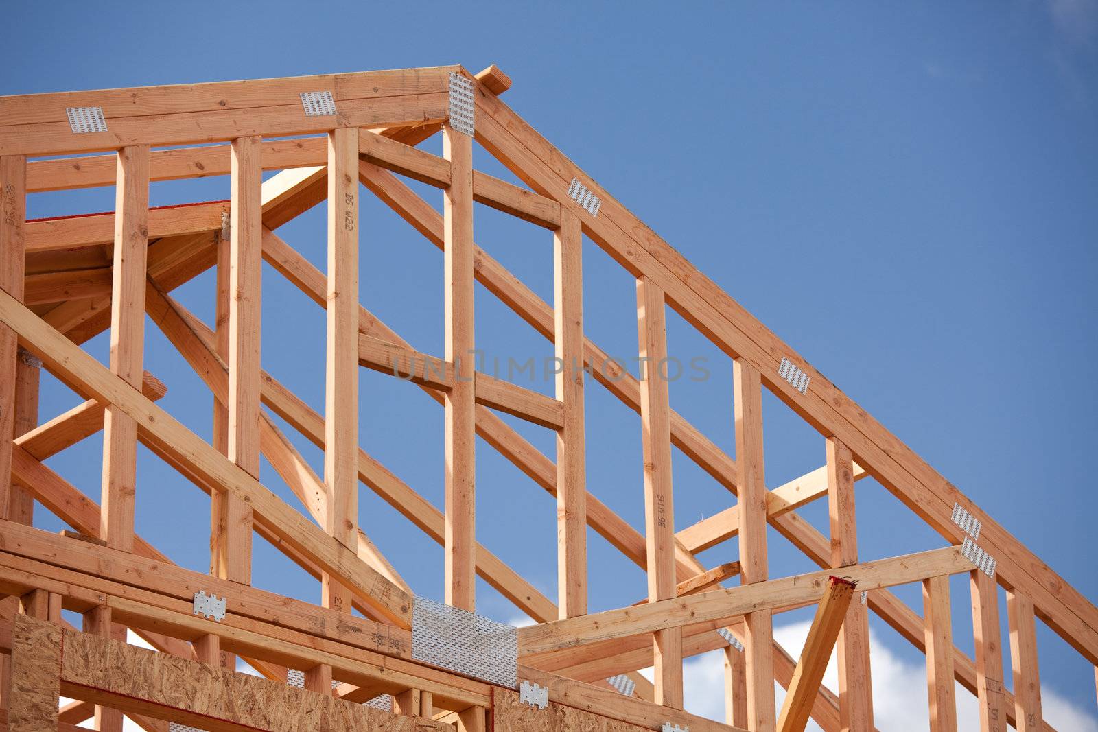 Abstract of New Home Construction Site Framing.