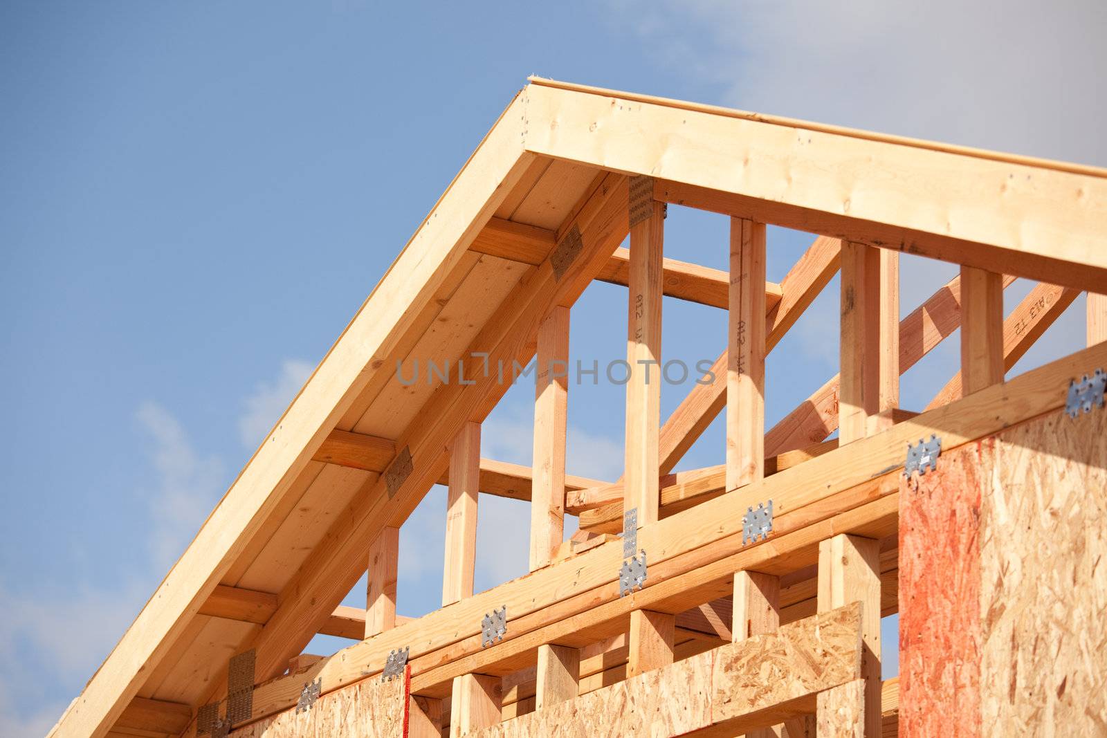 Abstract of New Home Construction Site Framing.