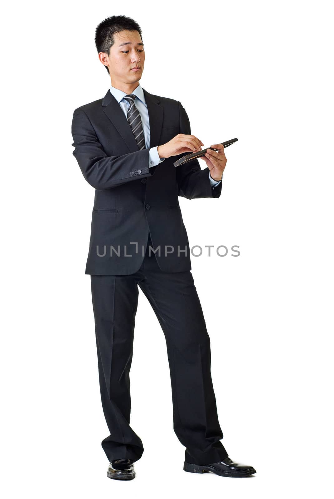 Young businessman of Asian using Chinese traditional calculator isolated on white background.