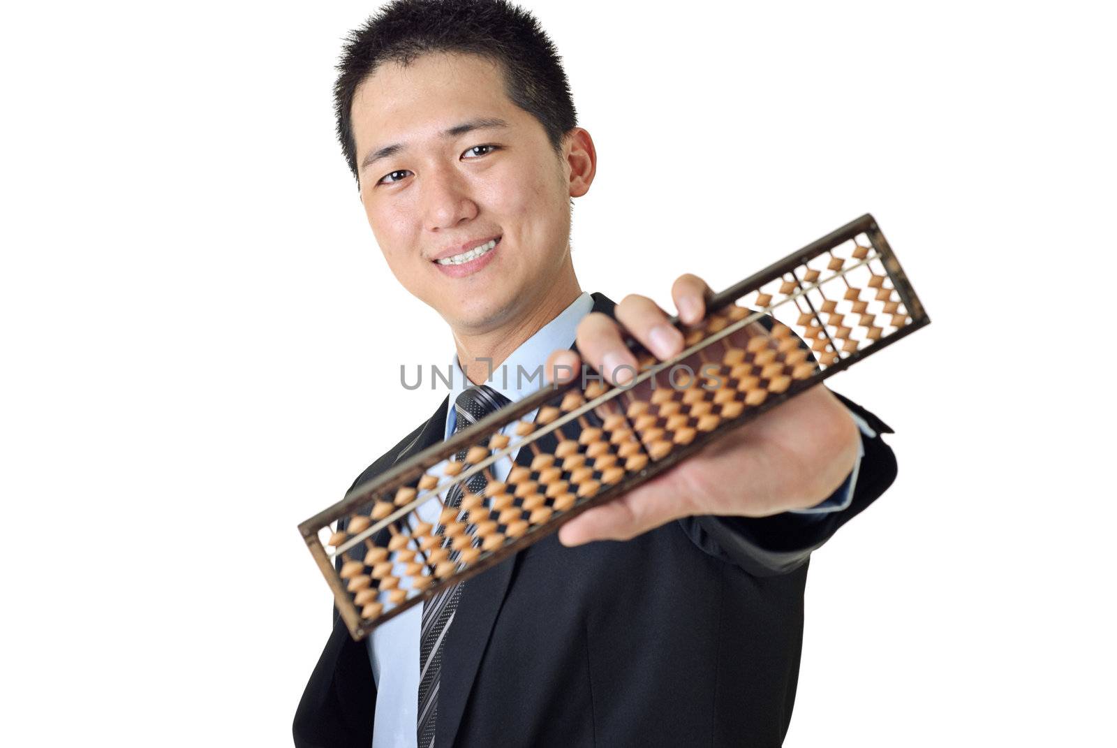 Young Asian businessman holding Chinese traditional calculator with smile on white background.