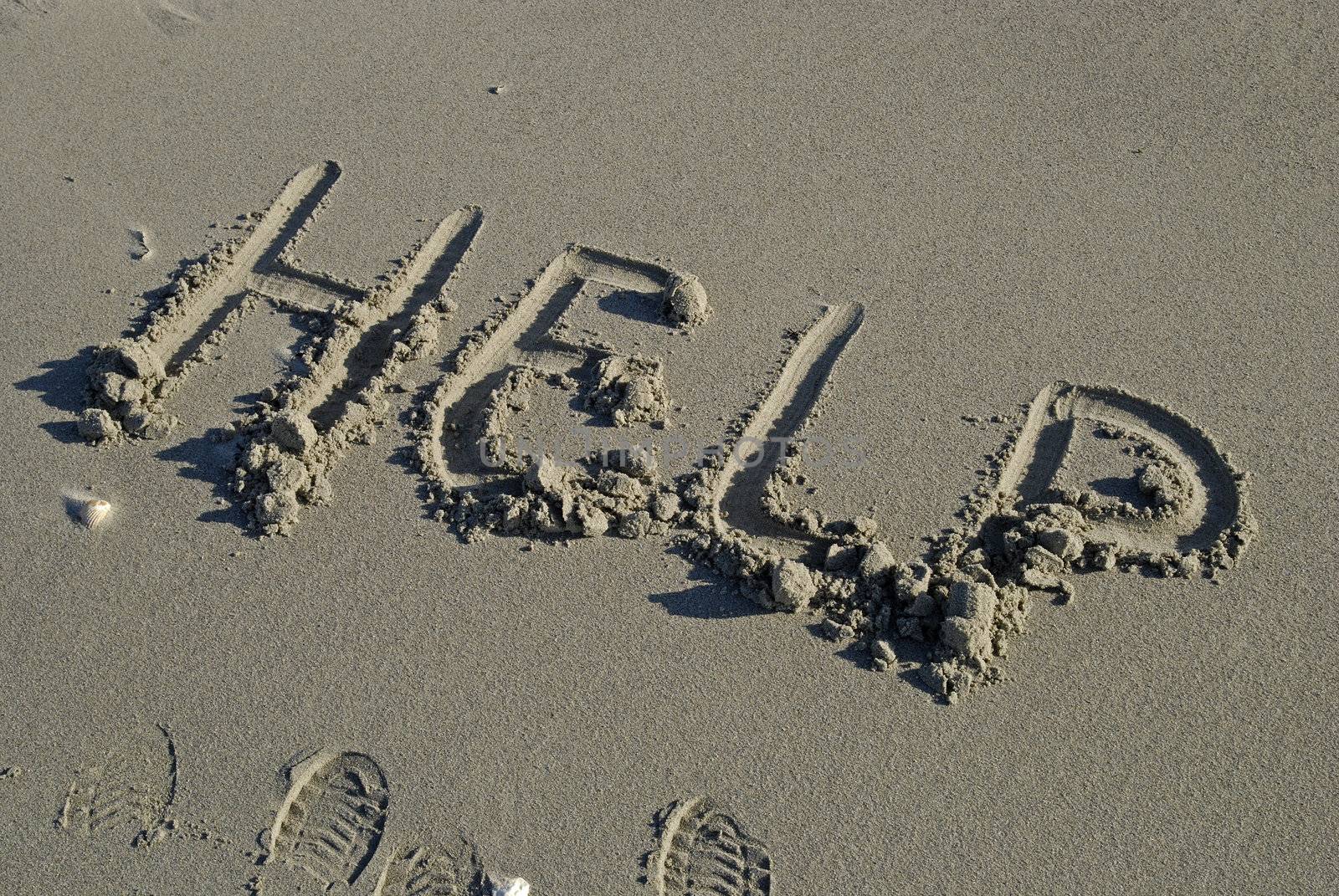 Help written in sand