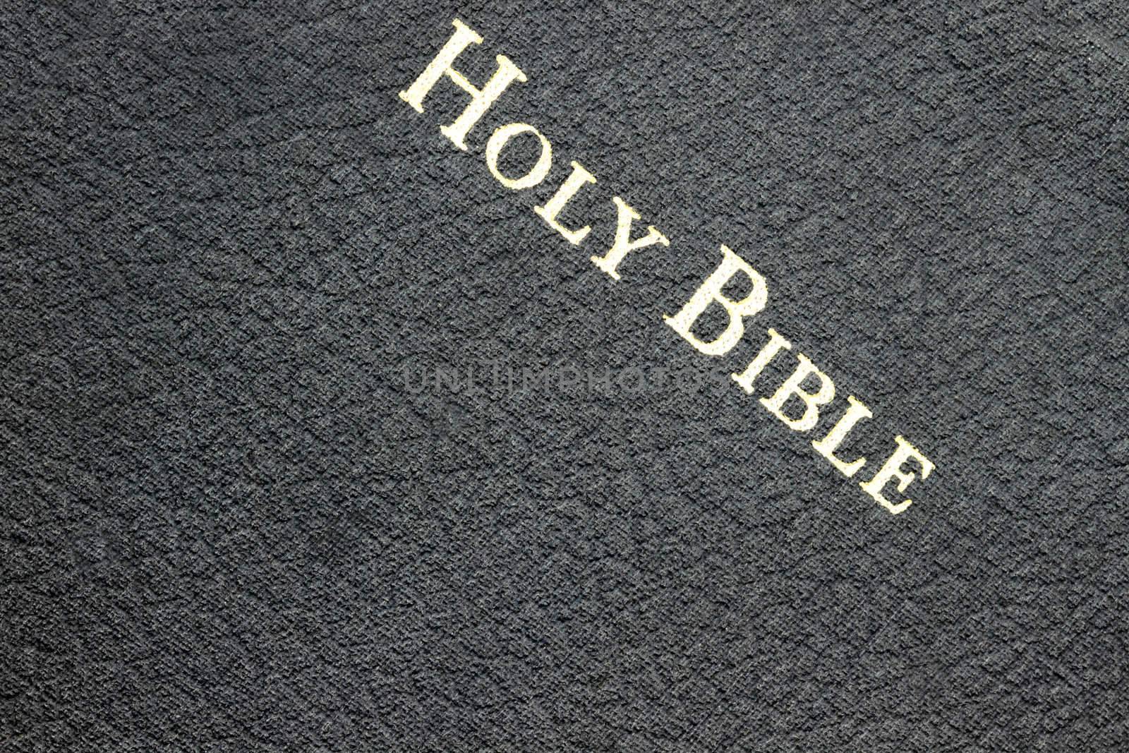 Macro of a black Christian Holy Bible.