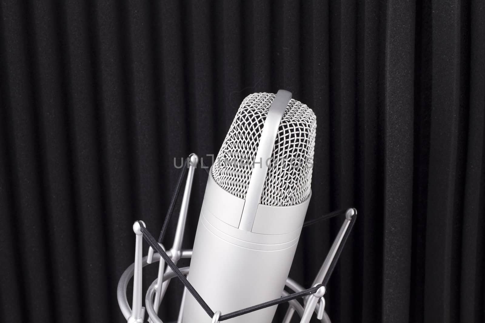 Professional studio microphone on white background by FernandoCortes