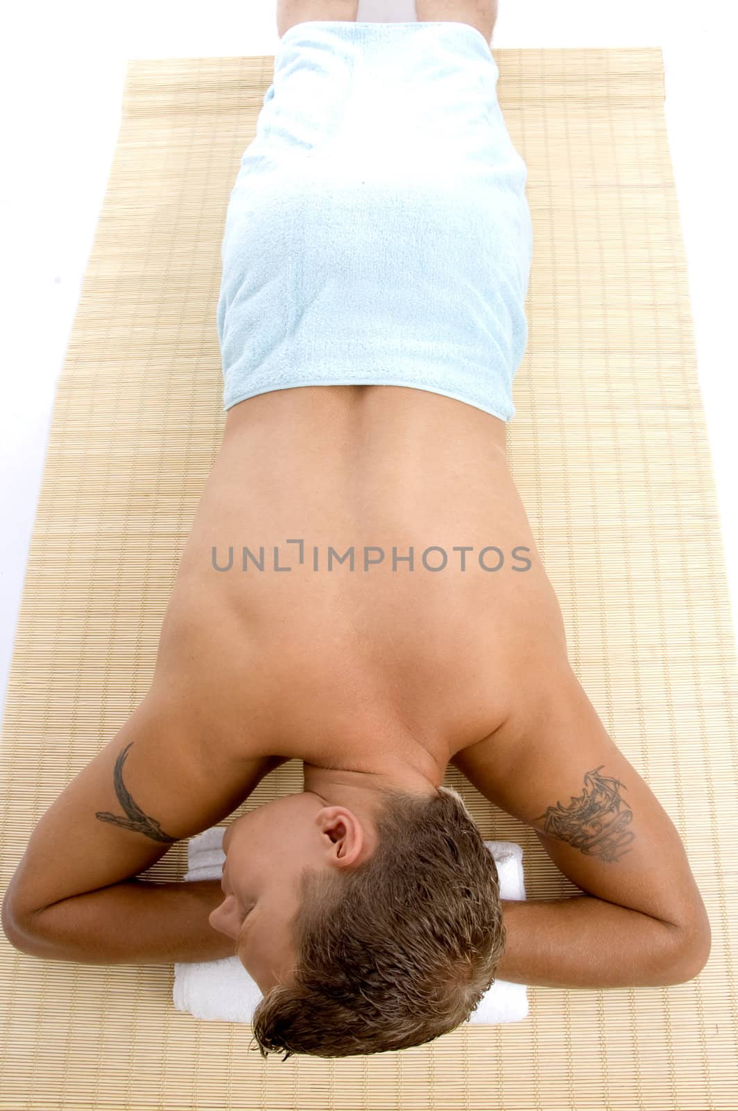 guy resting in spa on an isolated white background