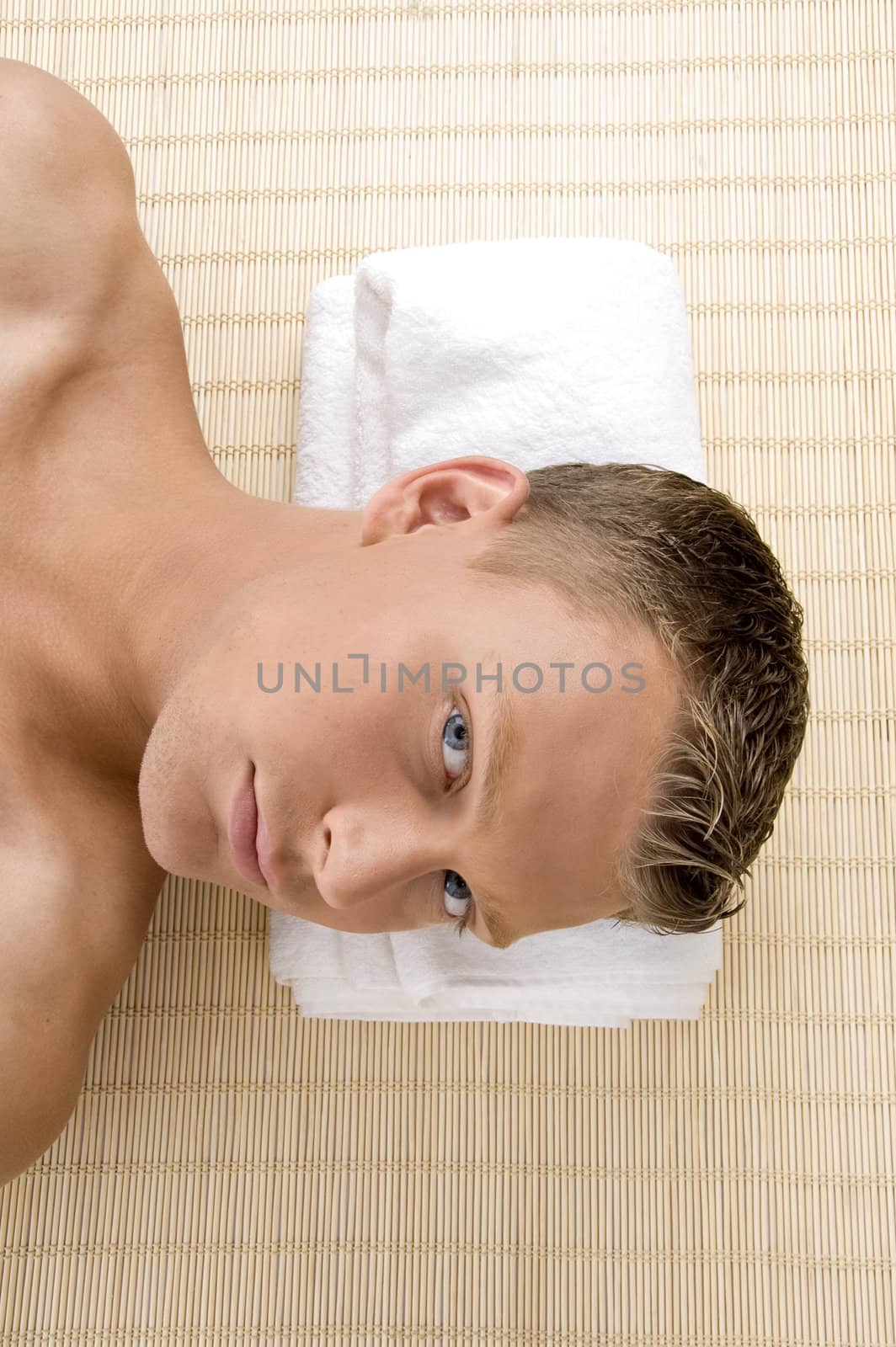 close up of man at spa with white background