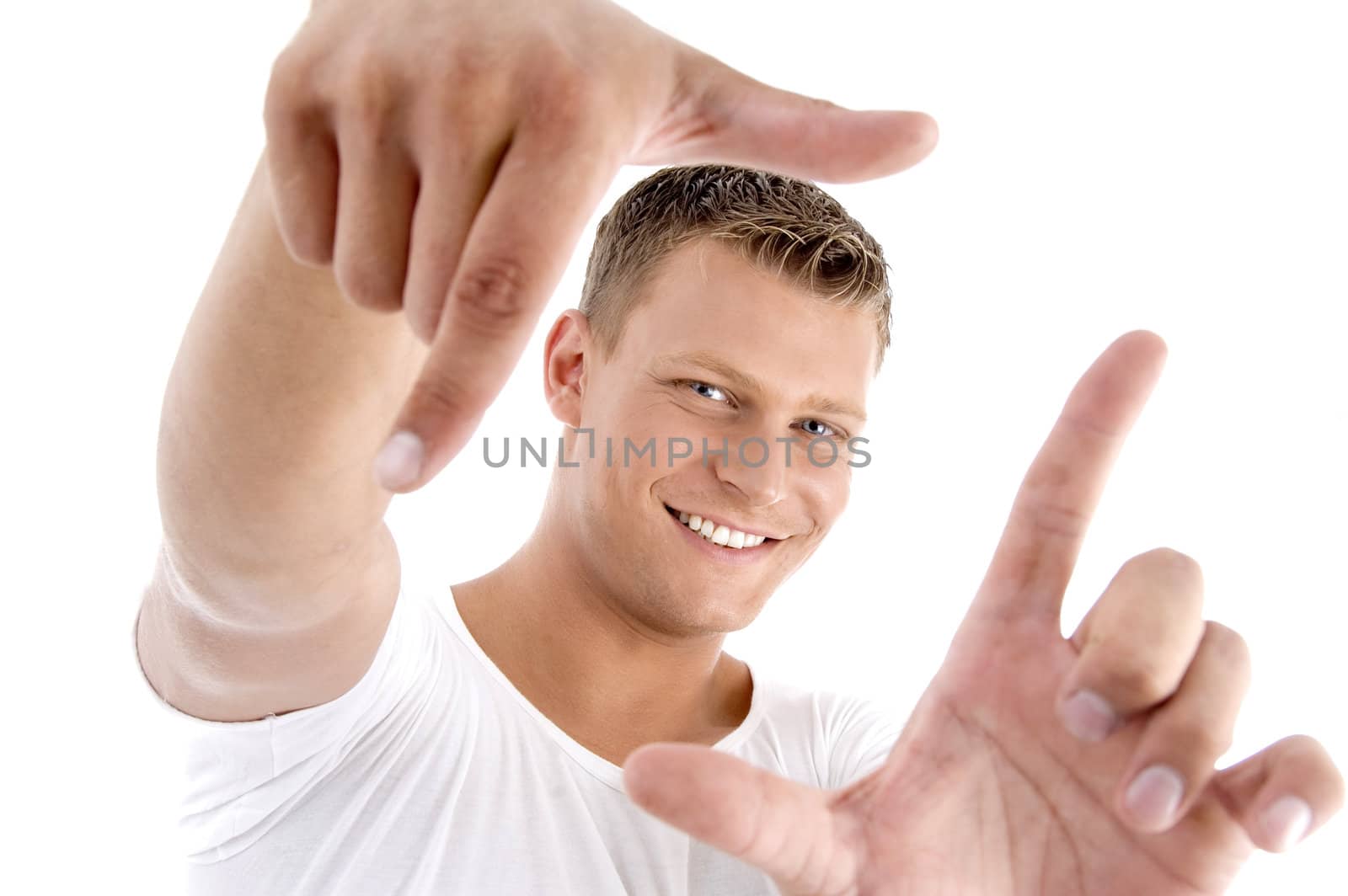 handsome model framing his face on an isolated white background