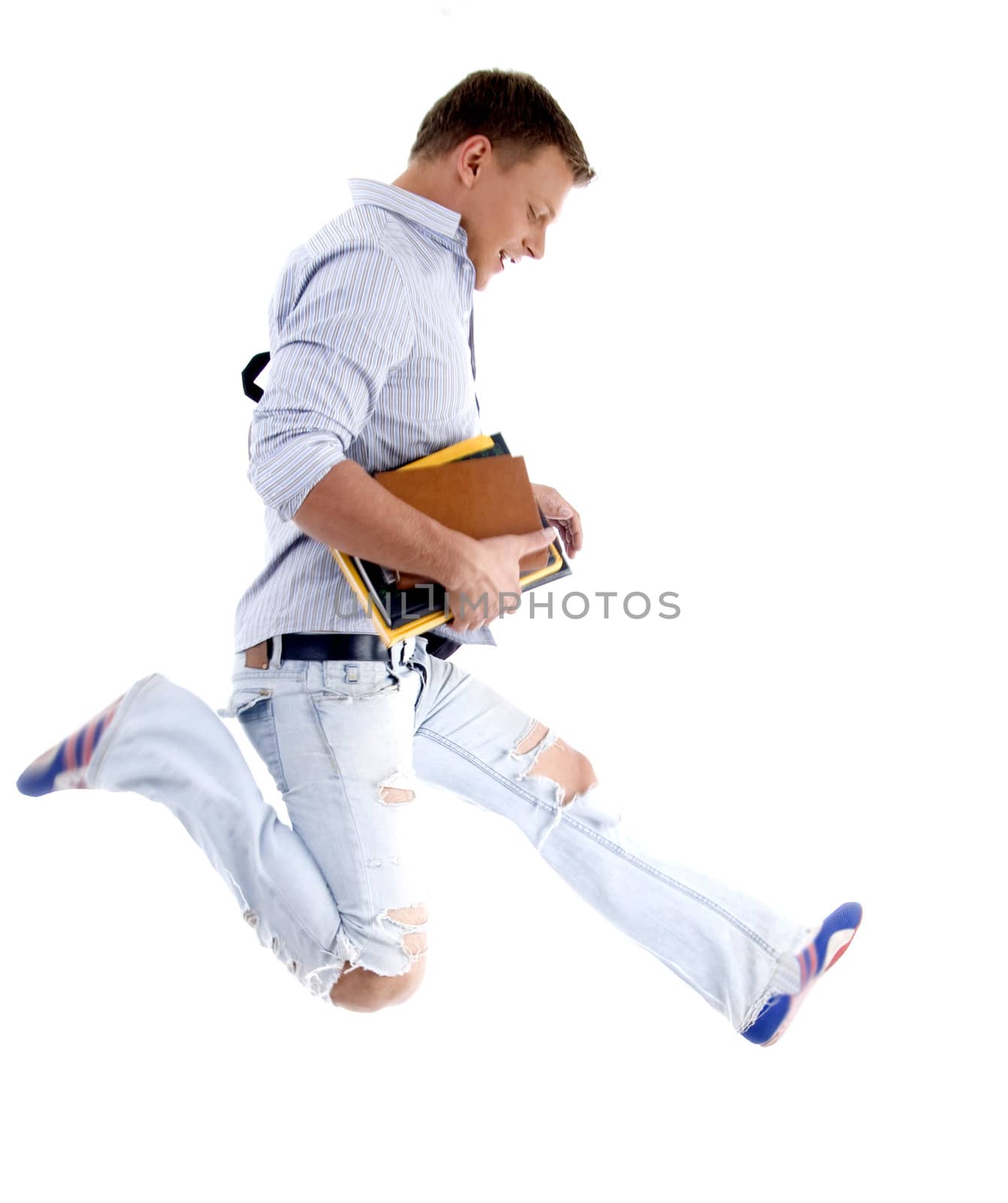 college student jumping high isolated on white background
